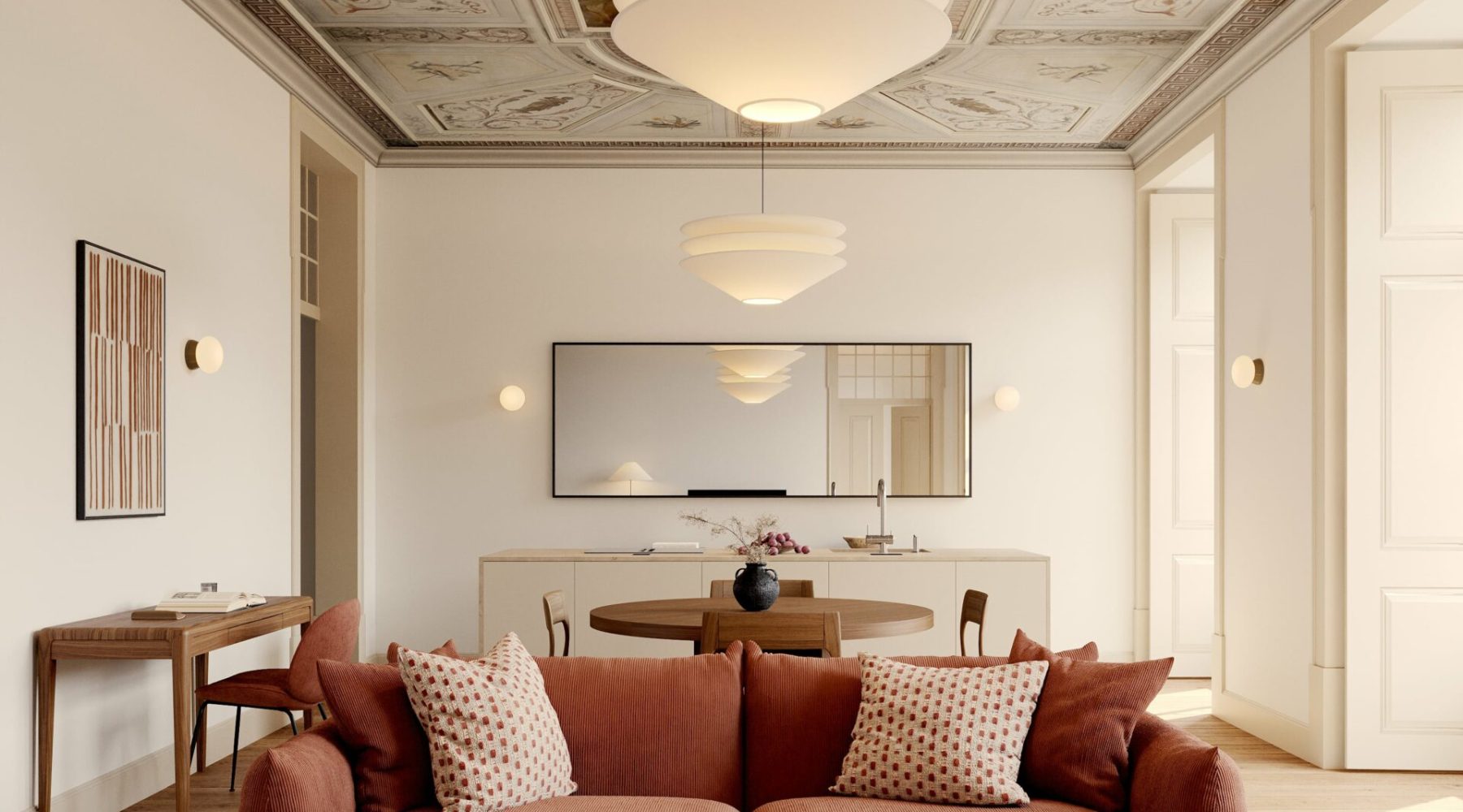 Elegant living room with ornate ceiling, modern furniture, red sofa, and geometric rug, creating a cozy, luxurious ambiance.