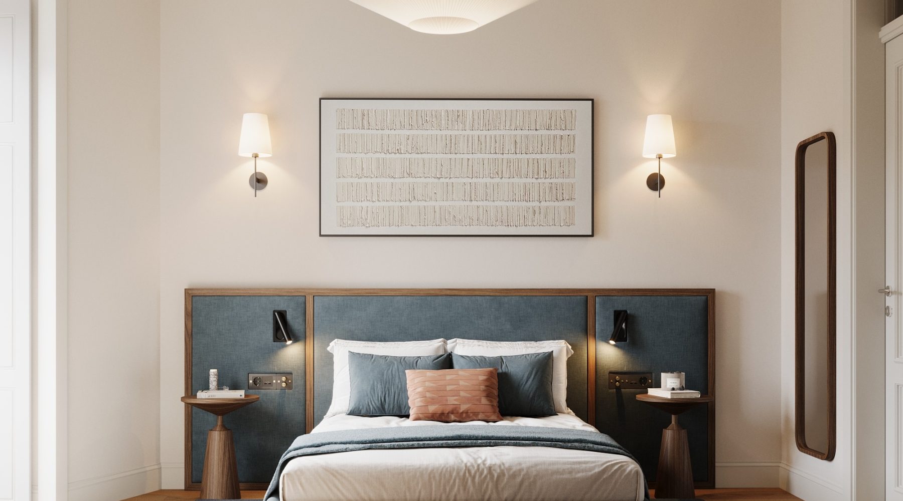Modern bedroom with blue upholstered headboard, bedside tables, wall art, and cozy lighting. Cozy and elegant design.