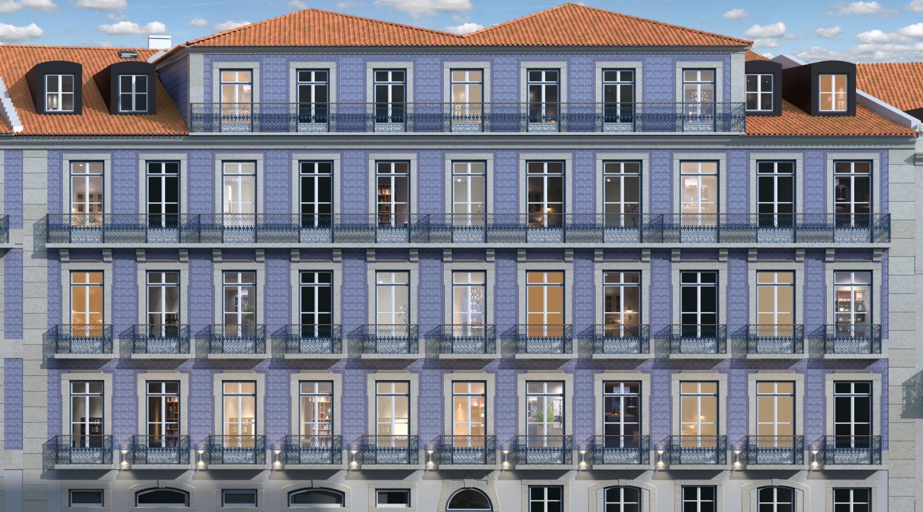 Elegant multi-story building with blue facade and balconies under a bright sky.